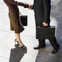 Two attorneys shaking hands.