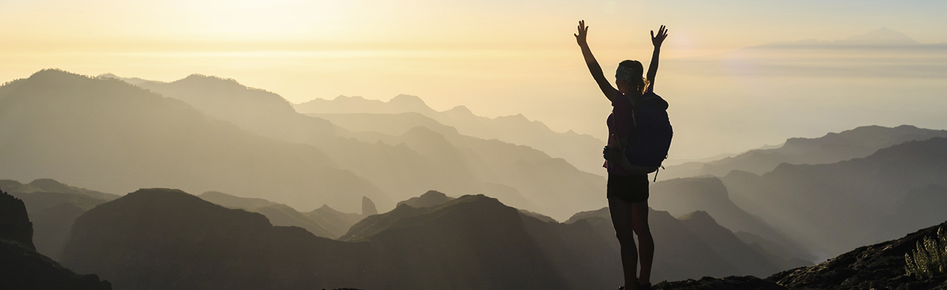 A climber reaching the peak.