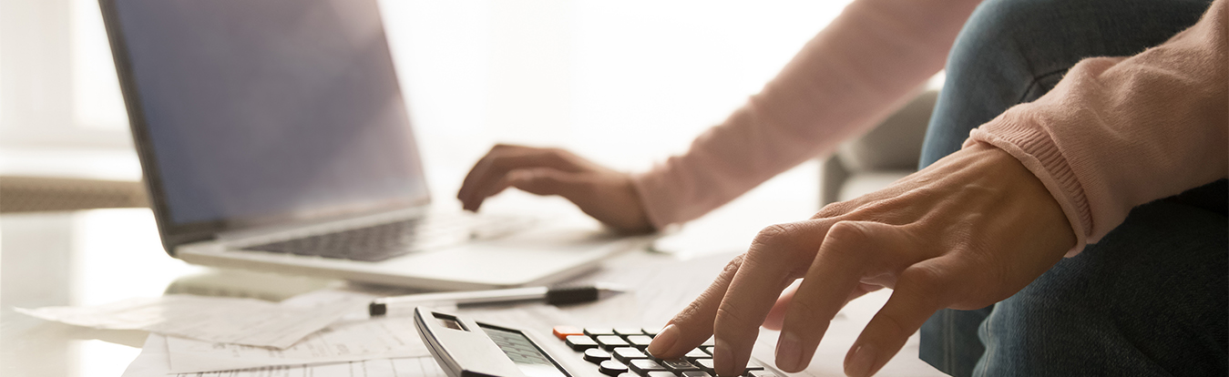 Lawyer using calculation and laptop