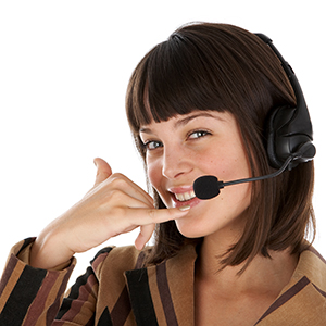 A woman with telephone headset on