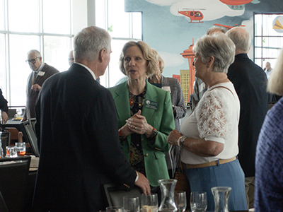 Chief Justice Debra Stephens chats with attendees at the Washington State Bar Association's 50-year Member Luncheon at the Museum of Flight in Seattle June 6, 2025