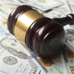 A gavel on Benjamins